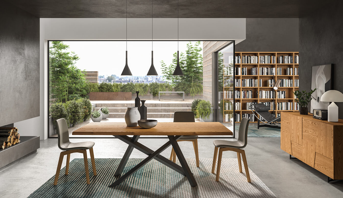 Tavolo in legno con gambe incrociate grigio scuro e sedie con gambe in legno e seduta grigia